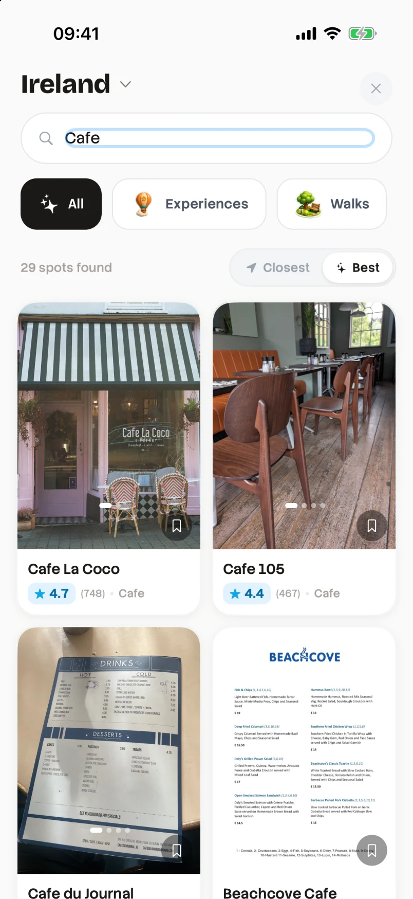 Doggo on iPhone: searching for cafés, with place photos, ratings and save buttons
